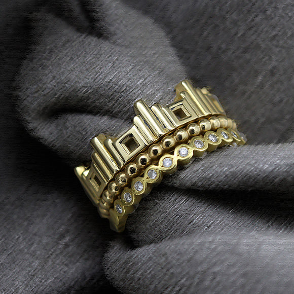Cathedral stack ring in yellow gold