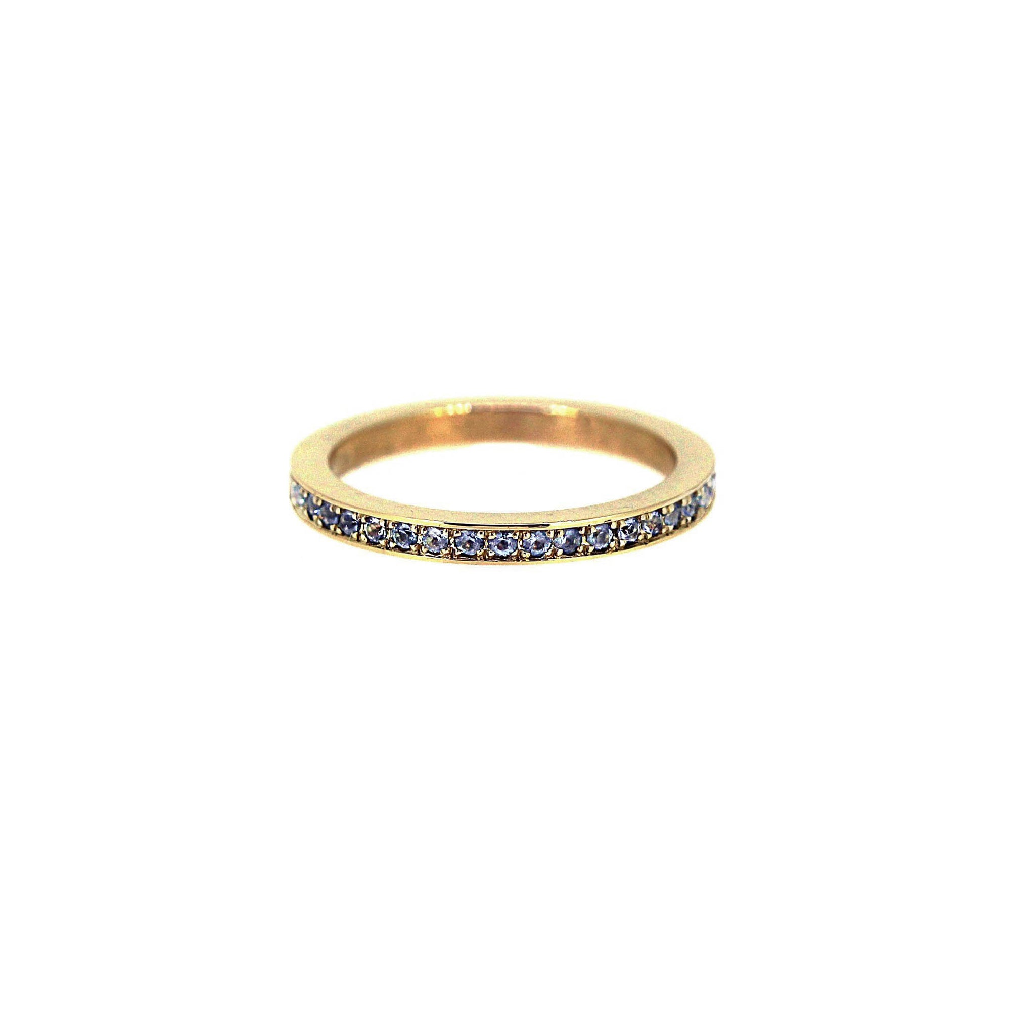 Pale blue aquamarine set in yellow gold band