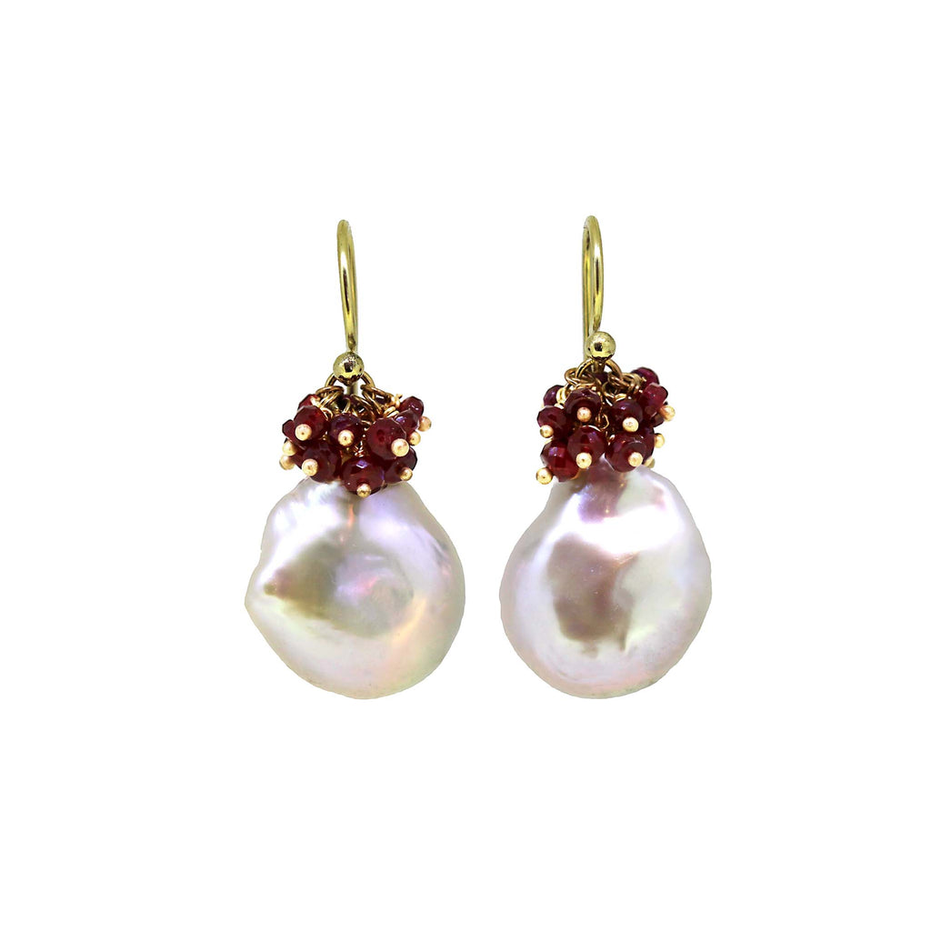 Baroque pearl earring with ruby hats on yellow gold hook