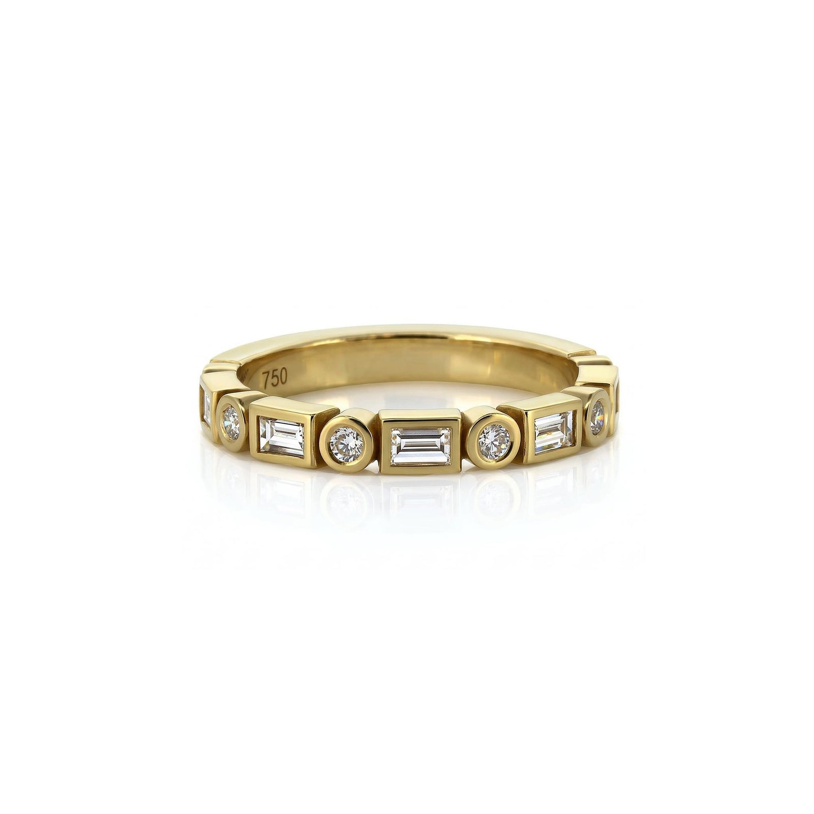 Gold ring with embedded diamonds on a white background