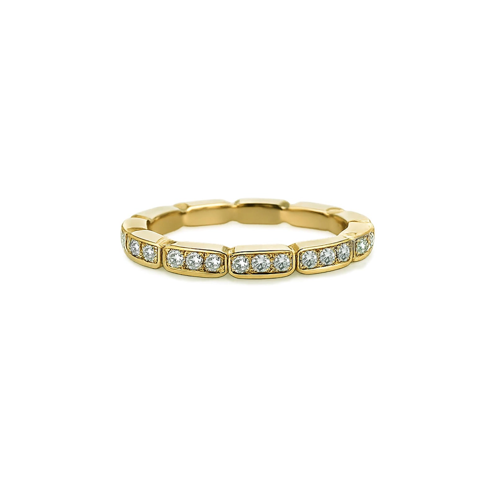 Gold ring with embedded diamonds on a white background
