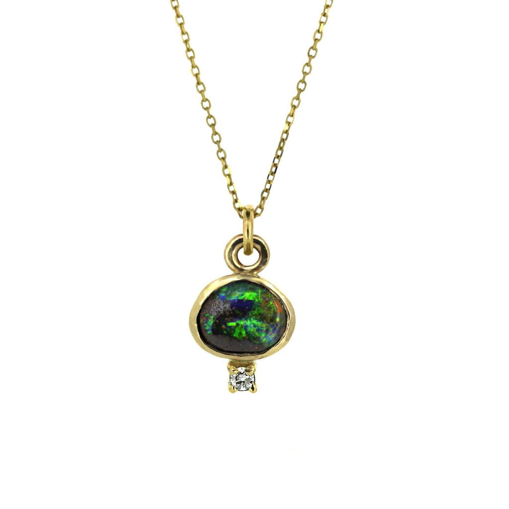 Petite oval boulder opal pendant with diamond detail