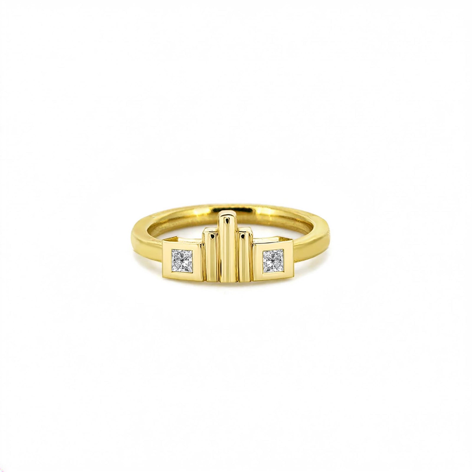 Gold ring with diamond accents on a white background