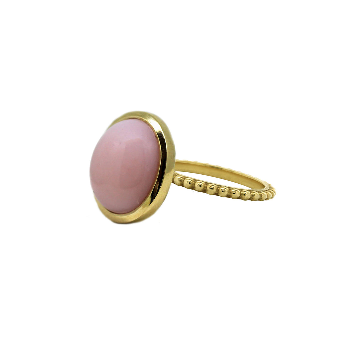 Pink opal oval cabochon ring in yellow gold