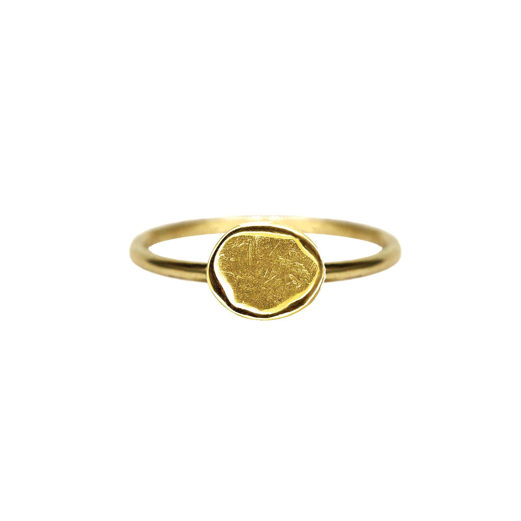 Seal stack ring set east west on yellow gold band