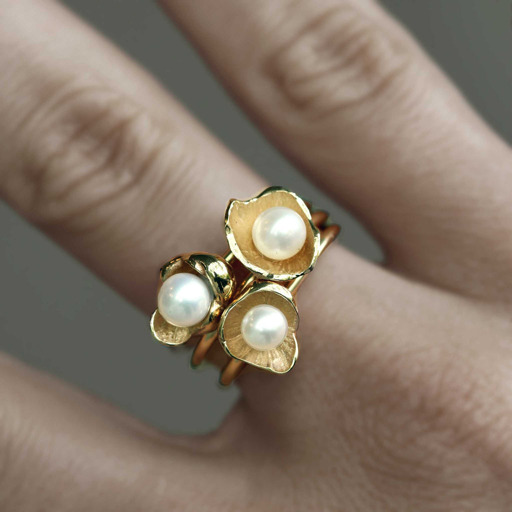 Sunken treasure ring stack of pearls and gold