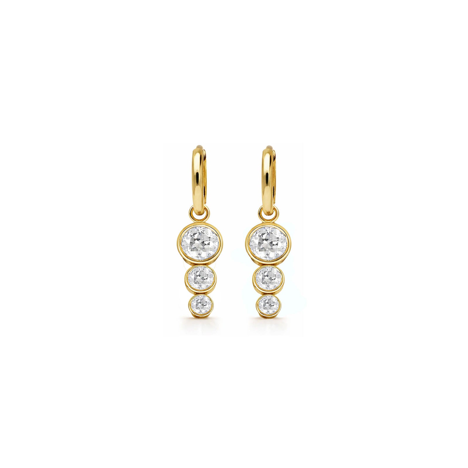 yellow gold diamond drops with thress diamonds descending from yellow gold huggies