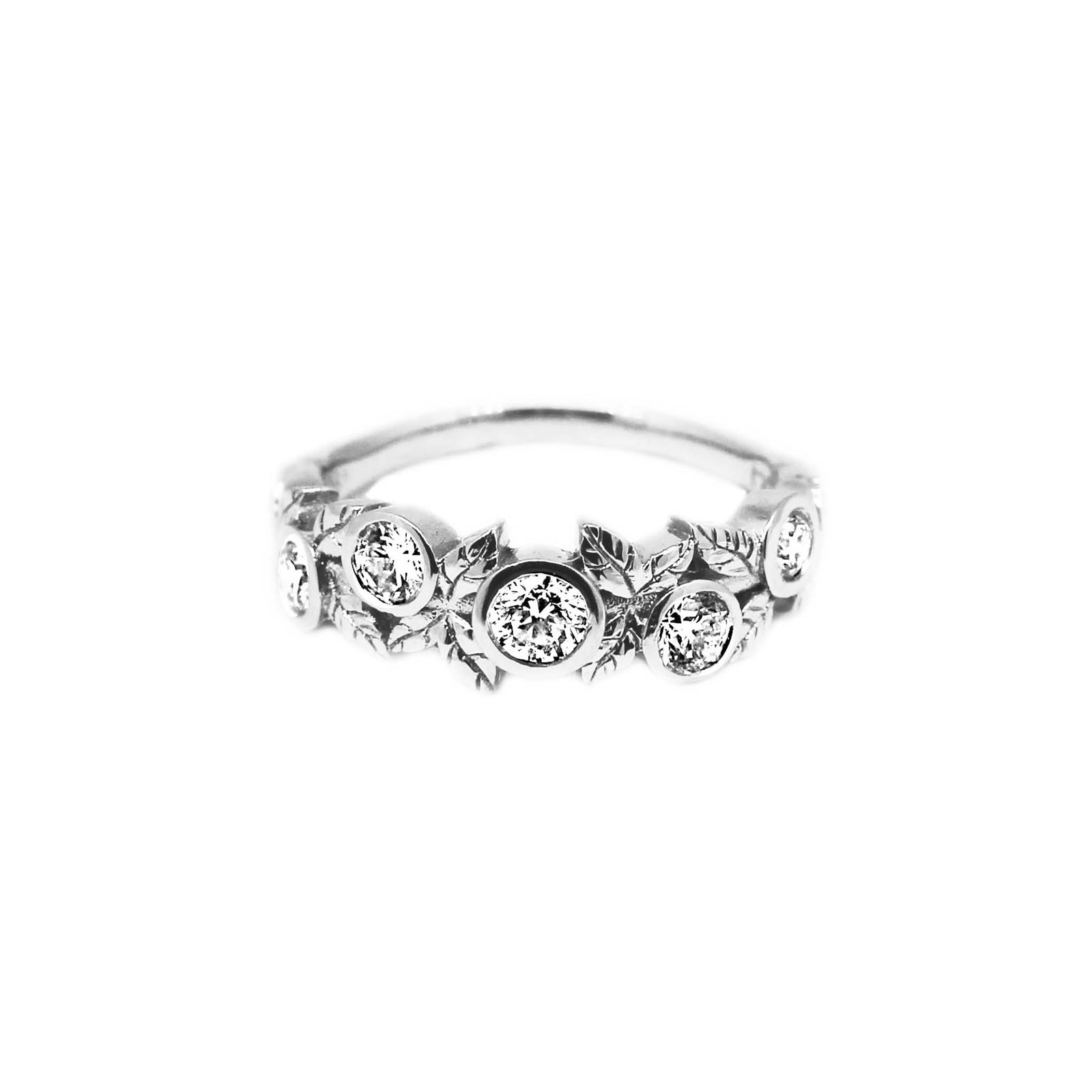 Diamond vine ring in 18k white gold.