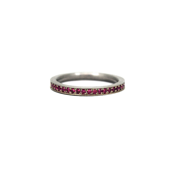 Hot pink sapphires pave set into white gold band