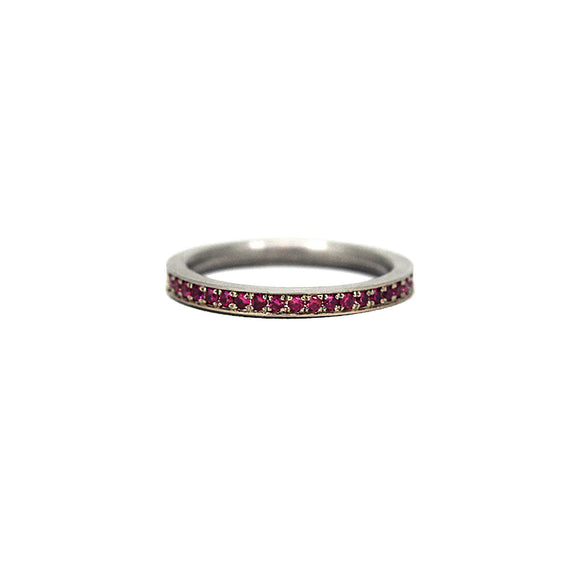 Hot pink sapphires pave set into white gold band