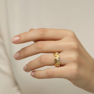 yellow gold and diamond ring art deco style on model hand