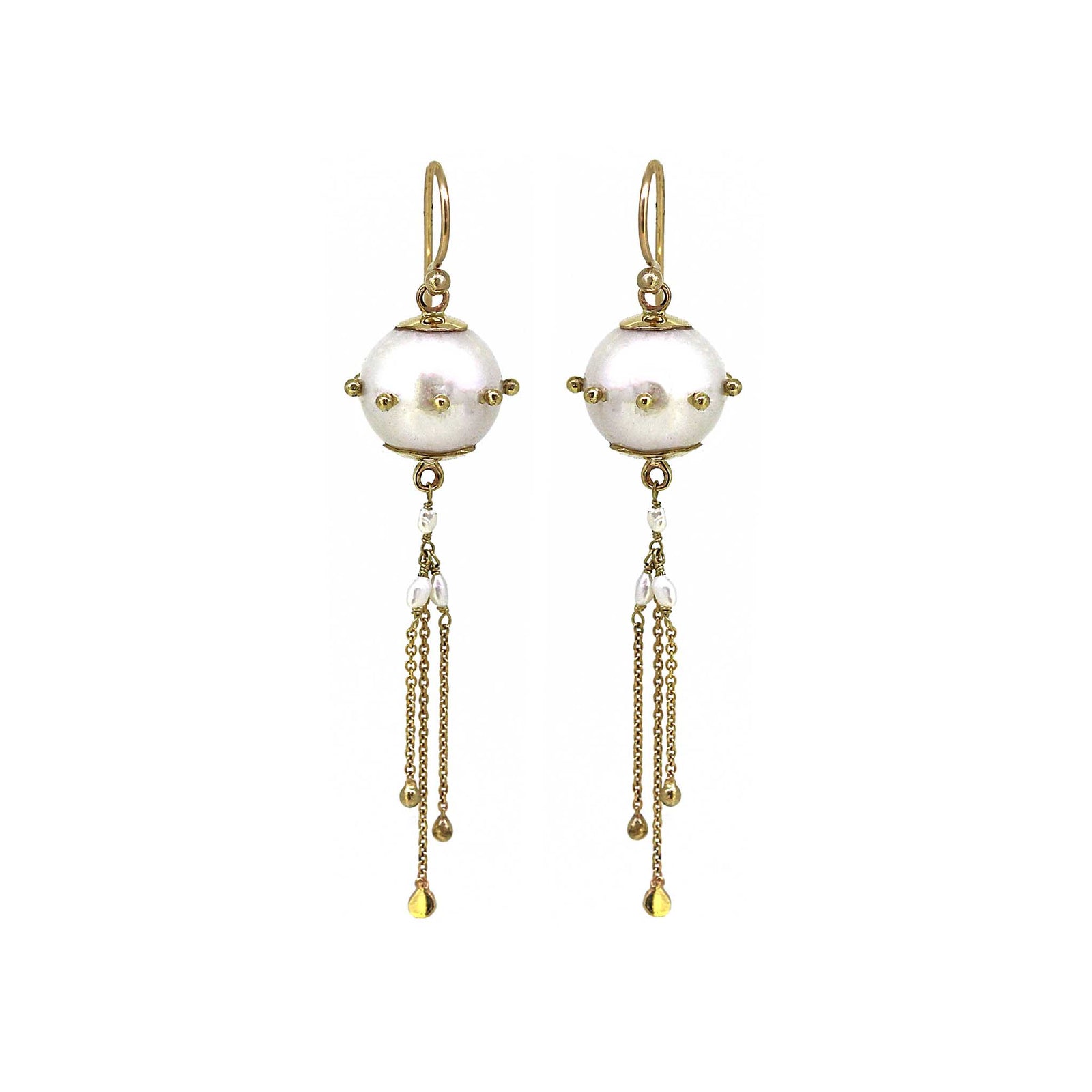 Pearl jellyfish earrings are white freshwater pearls with gold chain tassles
