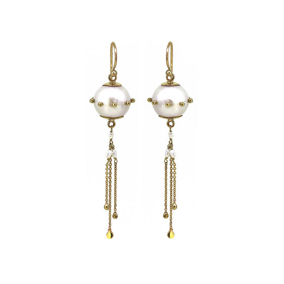 Pearl jellyfish earrings are white freshwater pearls with gold chain tassles