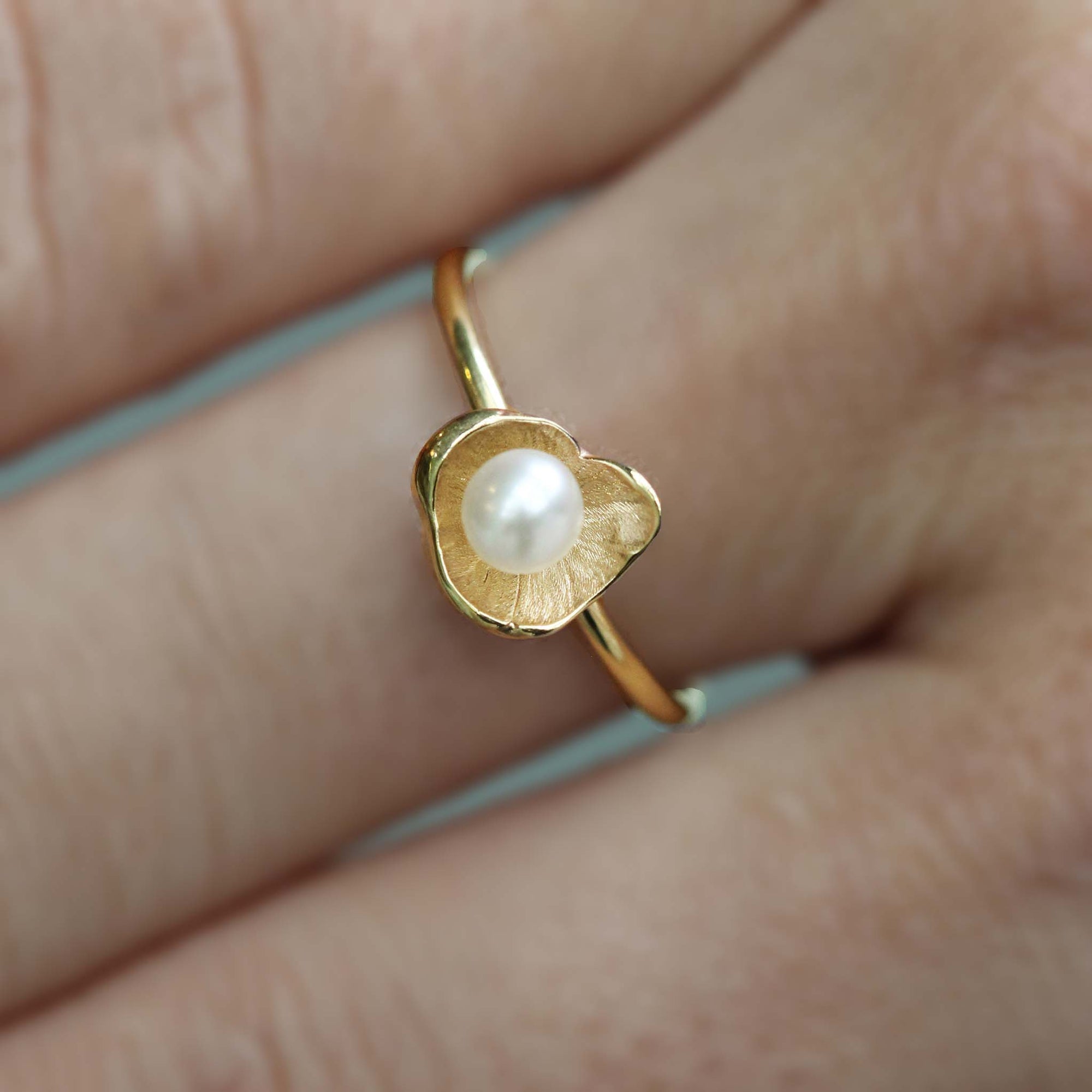 Small sunken treasure pearl ring in yellow gold