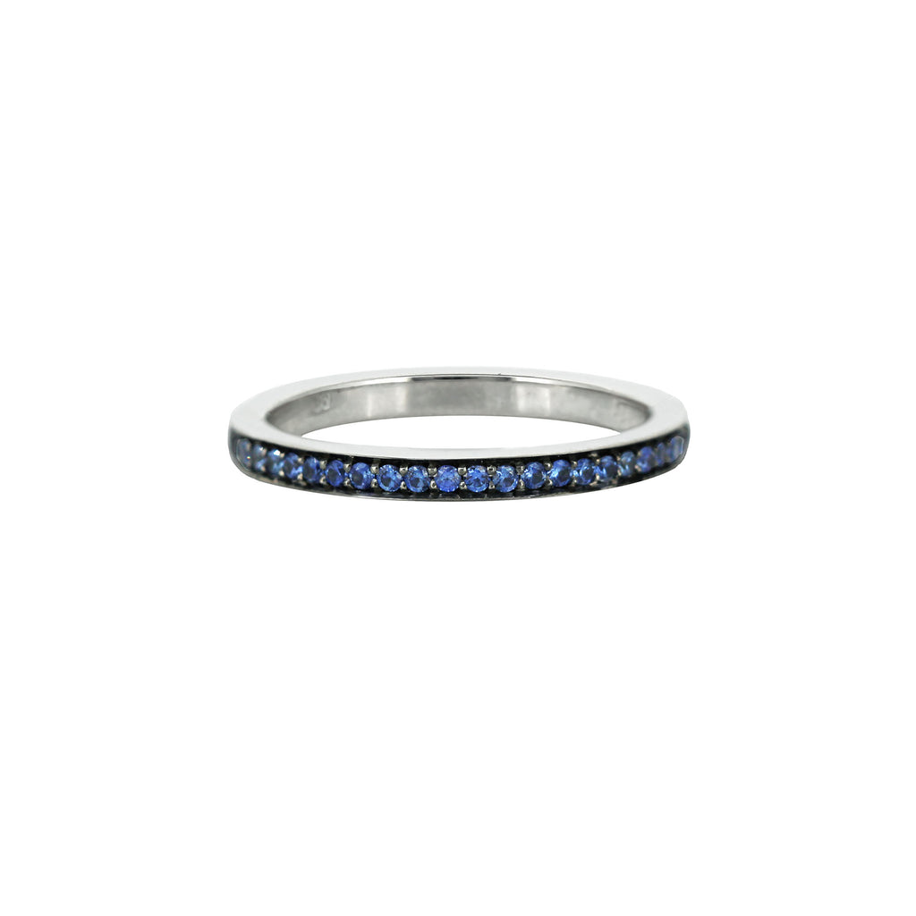 Blue sapphire band half set in white gold