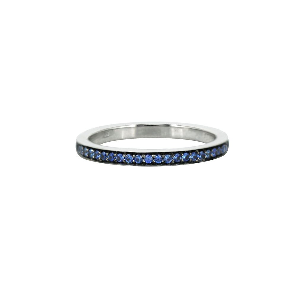 Blue spahhire band half set in 18k white gold