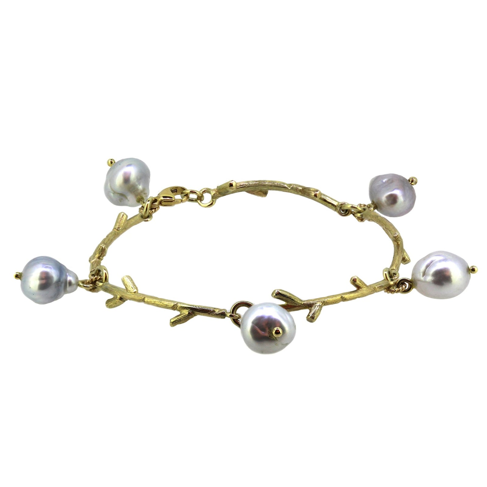 Corl Branch brcelet made of gold and baroque tahitian pearls