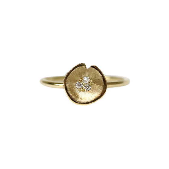 Medium Lilypad ring is one of three. can be worn alone or as a stack . YELLOW GOLD AND DIAMONDS