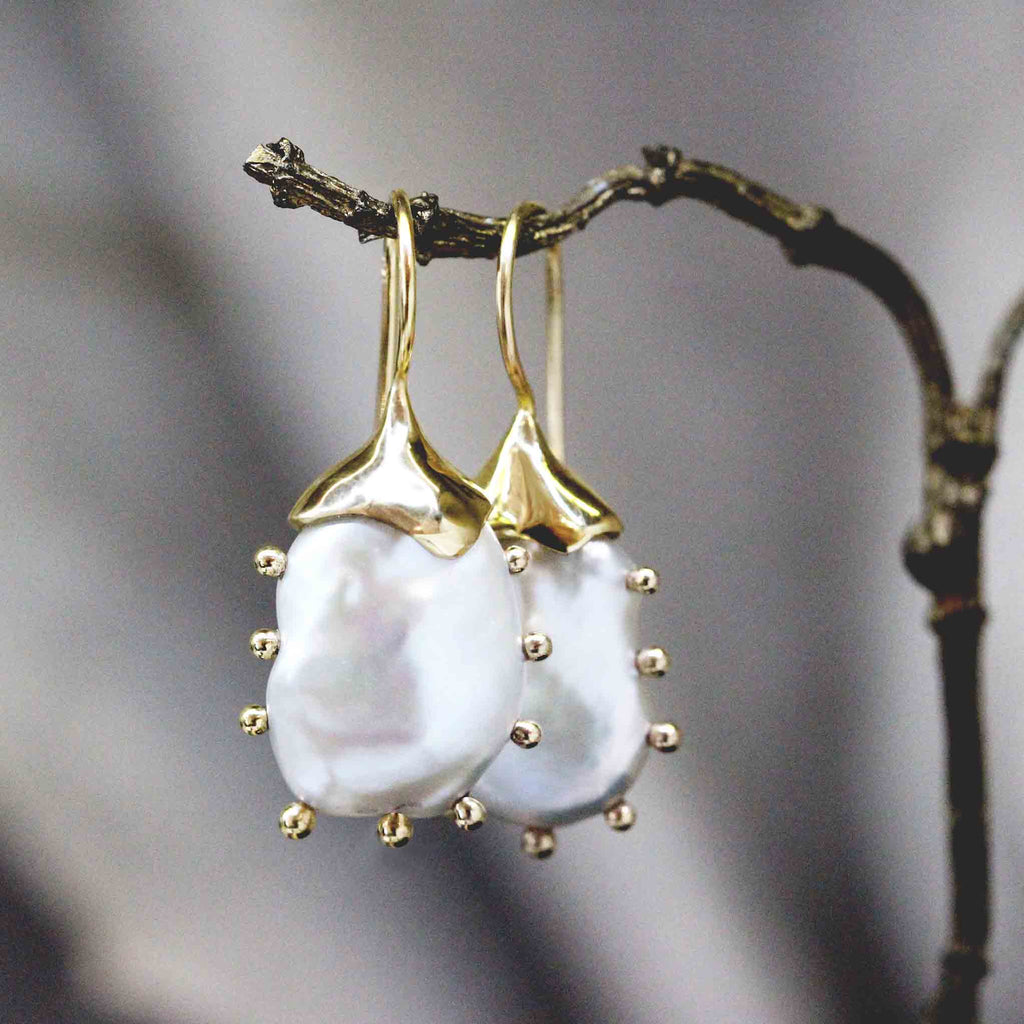 Gold studded pearl drop earrings