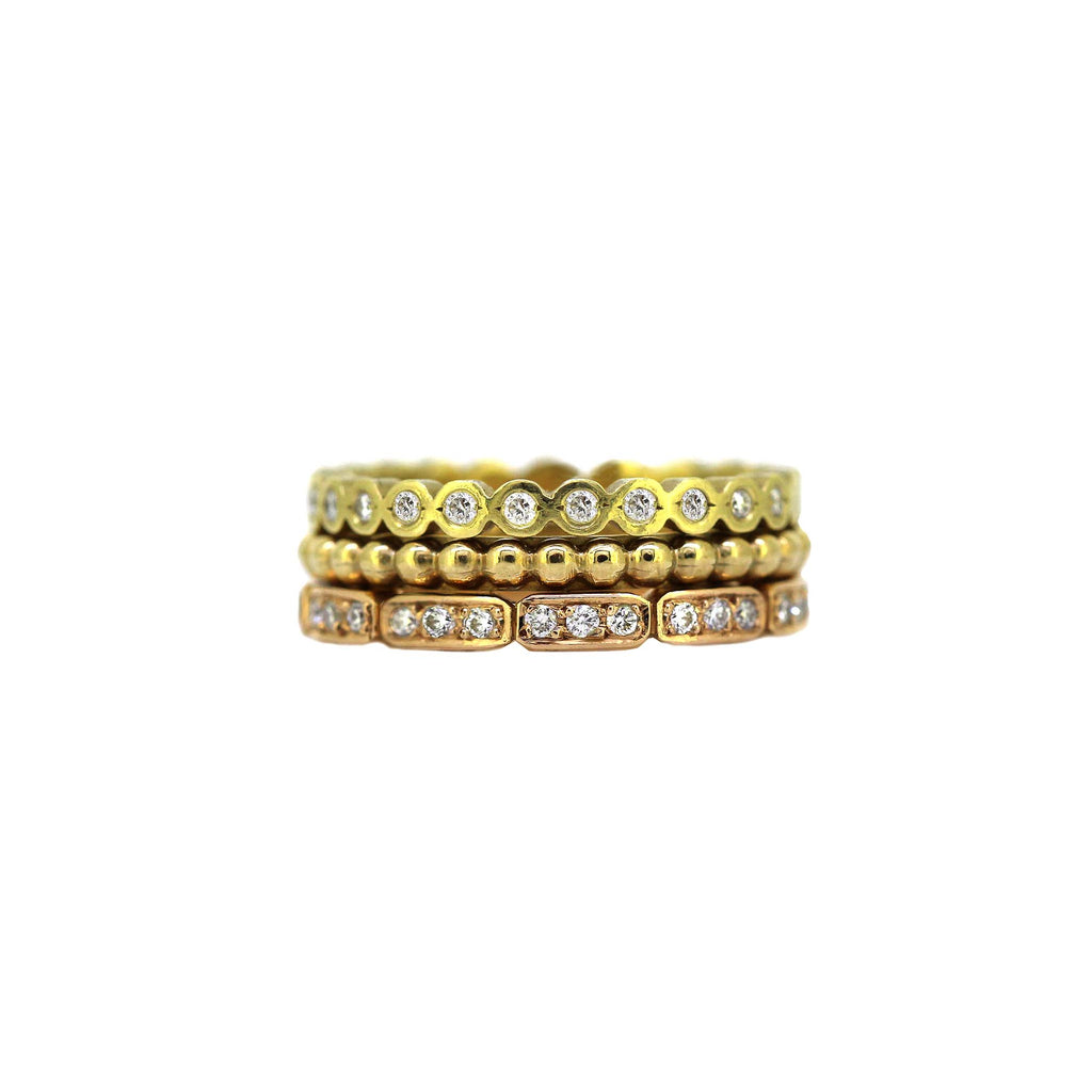 Triple Treat stack ring consist of the half set diamond dot ring, the ball stack ring and the half set metro band