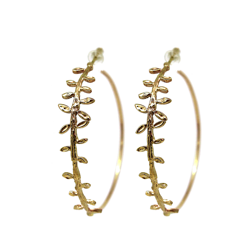 Large gold hoop earrings with graduating leaf pattern. Perfect for statement earrings. 9k carat yellow gold