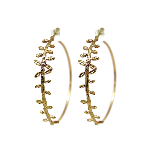 Large gold hoop earrings with graduating leaf pattern. Perfect for statement earrings. 9k carat yellow gold
