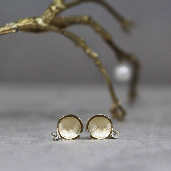 Petite diamond stud earrings with diamond detail